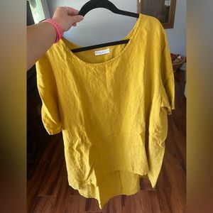 Smoke free home. Size XL. Mustard colored, long shirt.